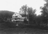 Unidentified house on a hill with stone wall, Williamsville, Vt.