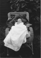 Fourteen week old Webster Thayer in a chair outside