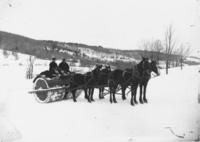 Men on snow roller pulled by horses, Dover, Vt.