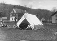Young men in front of a tent in Vermont