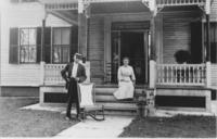 Couple on their porch in front of their house in Windham County,Vermont