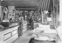 John A. Davis (and wife?) in his store in West Dover, Vt.