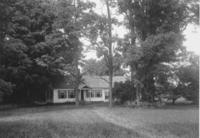 Farmhouse with large locust trees on Route 5 in East Dummerston