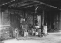 Interior of a blacksmith's shop in Jacksonville, Vt.