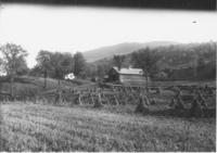 Field with corn harvest and barn, Townshend, Vt.