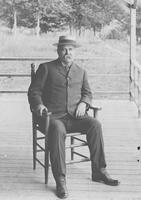 Admiral Clark on the porch of the Lake Mansfield Trout Club