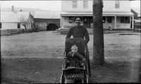 Woman with a child in a baby carriage