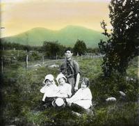 Reverend F.M. Hazen and children of Johnson, VT - Jay Peak in                              the background