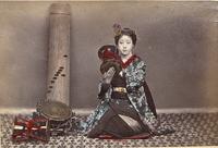 Female musician with koto and Ōtsuzumi