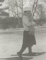 Woman on snowshoes
