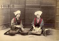 Two women preparing a meal
