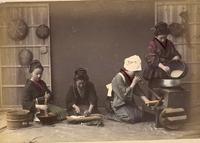 Four women preparing a meal
