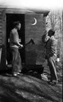 Bill Scott and Tom Sproston outside the research shed